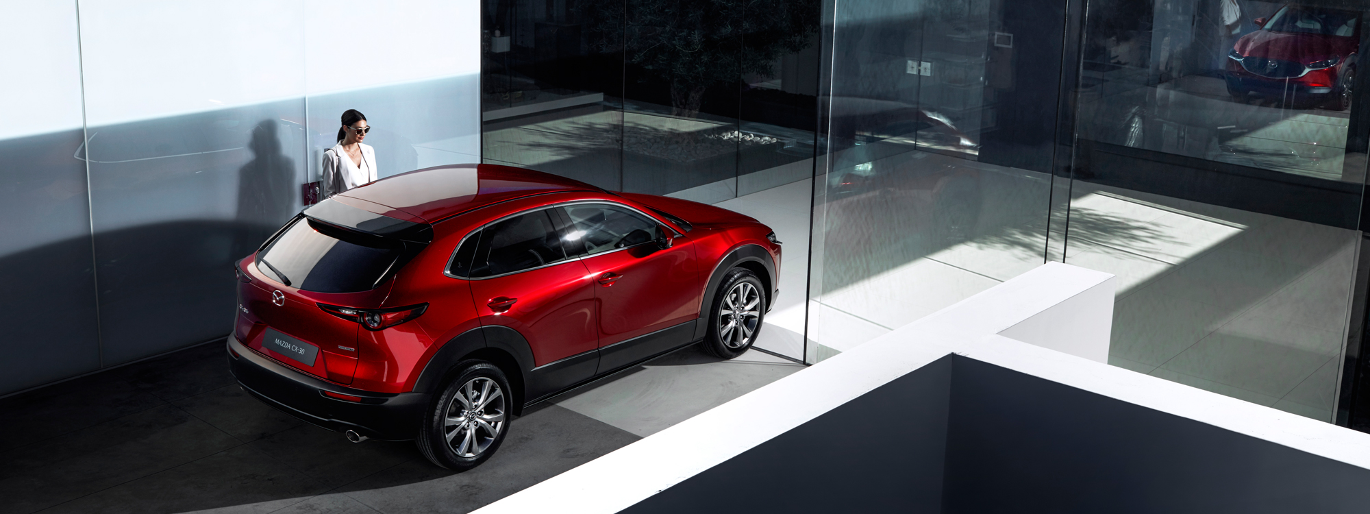 Mazda CX-30 with a woman